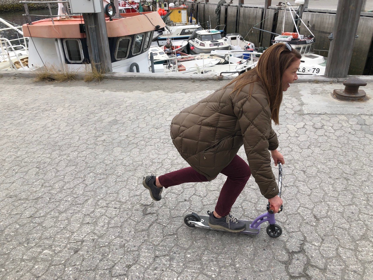 Renée scooting through a harbor